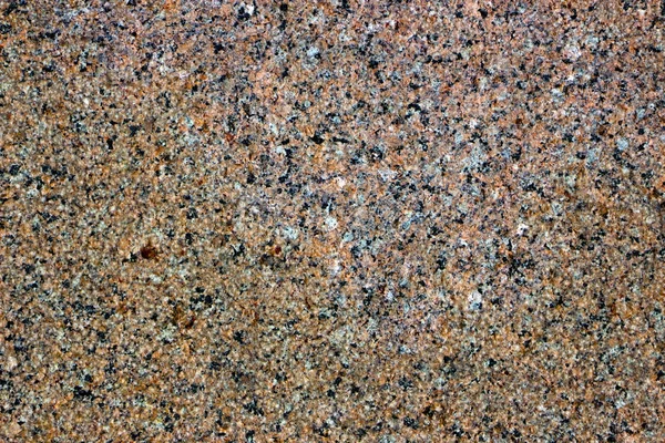 Granitstruktur, rote Basis mit schwarzen und grauen Punkten — Stockfoto