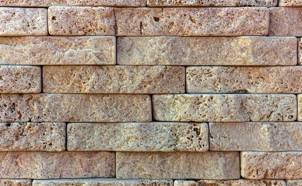 Stone wall textur, travertin kakel motstående sten — Stockfoto