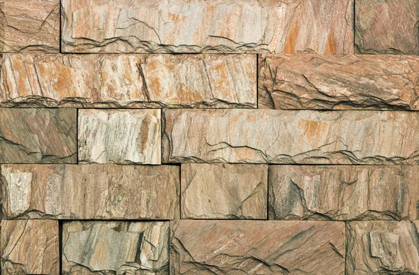 Textura de pared de piedra, azulejos travertino frente a la piedra —  Fotos de Stock