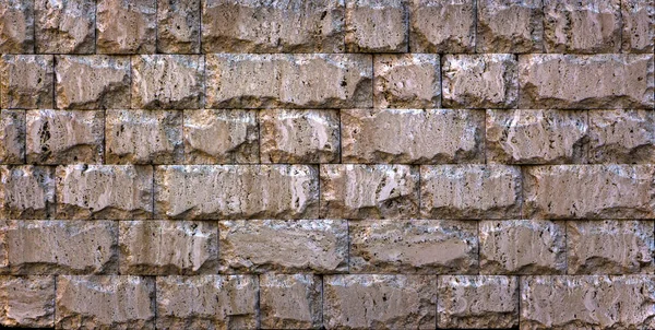 Struttura della parete di pietra, piastrelle di travertino di fronte alla pietra — Foto Stock