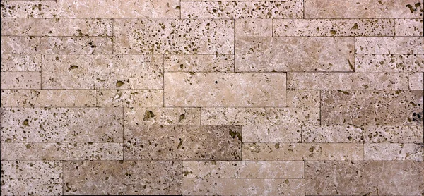 Πέτρινο τοίχο υφή, τραβερτίνη πλακάκια πέτρα που αντιμετωπίζουν — Φωτογραφία Αρχείου