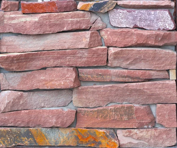 Vermelho ardósia pedra parede fundo textura — Fotografia de Stock