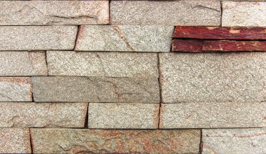 birden fazla taşlarla yapılan sanatsal duvar parçası