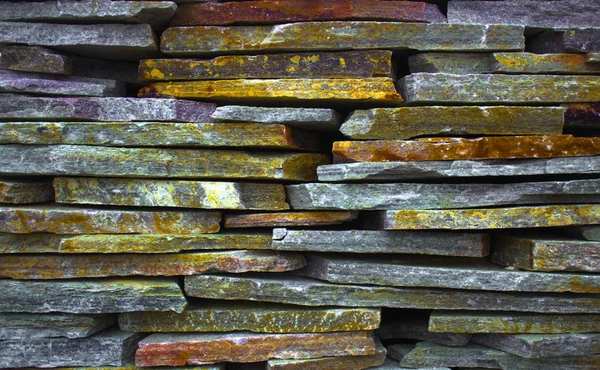 Fragment of artistic wall made with multiple stones — Stock Photo, Image
