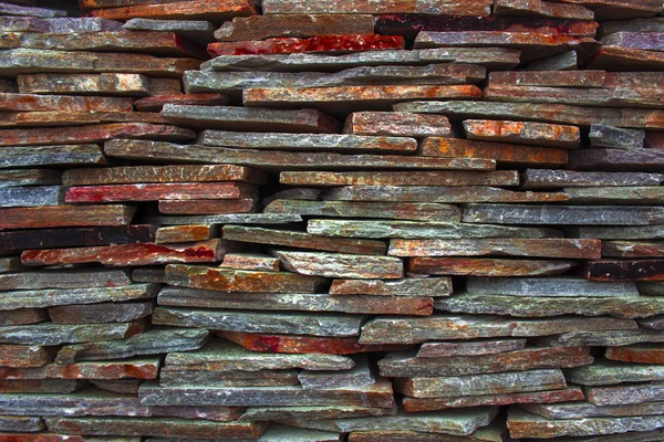 Fragment of artistic wall made with multiple stones — Stock Photo, Image