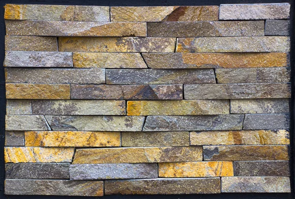 Moderne Multi kleur Stone, slate travertijn zandsteen muur gebruikt voor achtergrond — Stockfoto