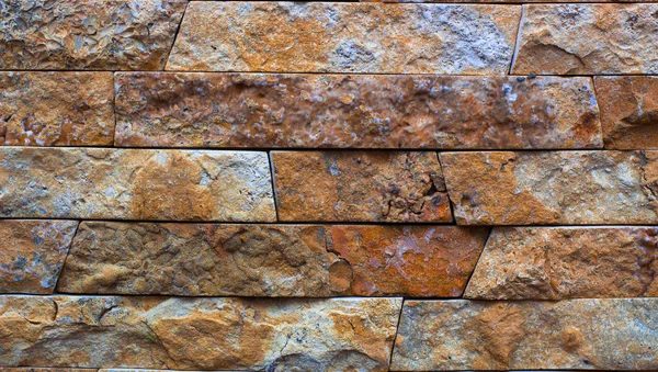 Piedra multicolor moderna, pizarra travertino arenisca pared utilizada para fondo — Foto de Stock