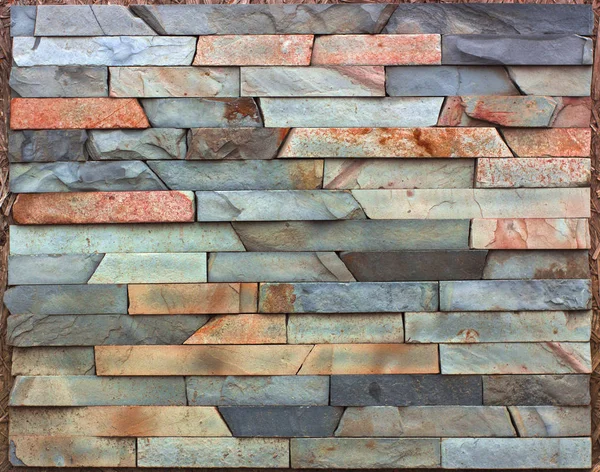 Piedra multicolor moderna, pizarra travertino arenisca pared utilizada para fondo — Foto de Stock