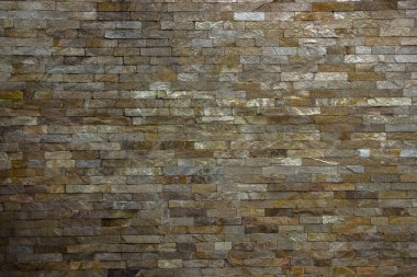 birden fazla taşlarla yapılan sanatsal duvar parçası