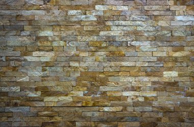 birden fazla taşlarla yapılan sanatsal duvar parçası