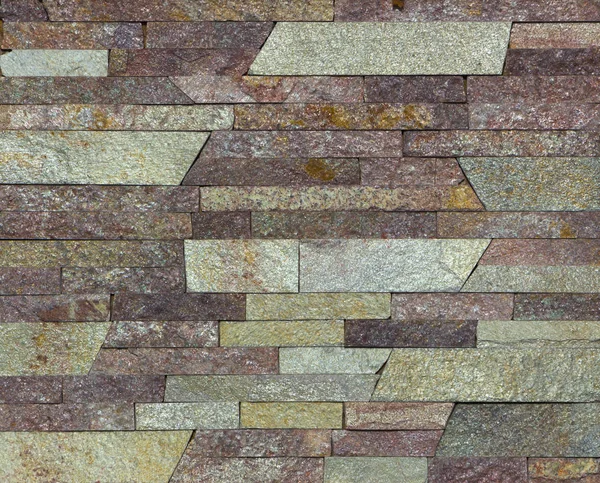 Piedra multicolor moderna, pizarra travertino arenisca pared utilizada para fondo — Foto de Stock