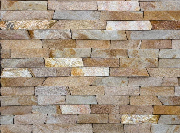 Muro de piedra multicolor moderno utilizado para fondo —  Fotos de Stock