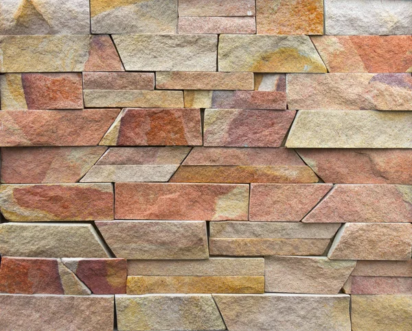 Piedra multicolor moderna, pizarra travertino arenisca pared utilizada para fondo — Foto de Stock