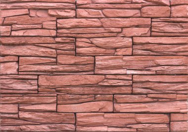 Beton döşeme arka plan veya doku olarak karşı karşıya gelen dekoratif tuğla duvar