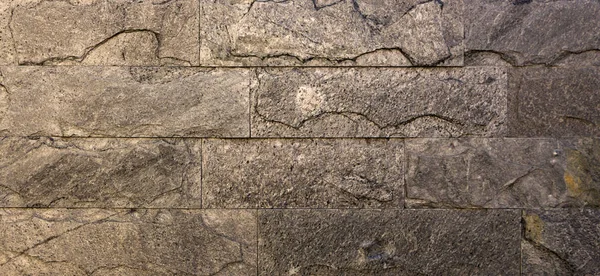 Marmeren textuur decoratieve baksteen, muur tegels gemaakt van natuursteen. Bouwmaterialen. — Stockfoto