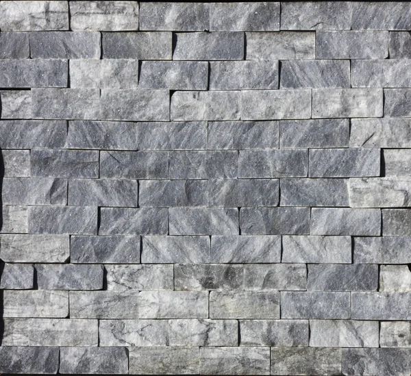 Marble texture decorative brick, wall tiles made of natural stone. Building materials. — Stock Photo, Image