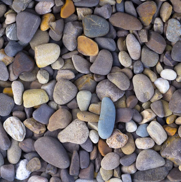 Polerade färgade marmor småsten och halvädelstenar bakgrund — Stockfoto