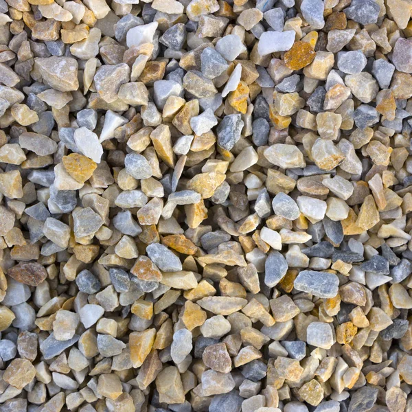 Texture, minta, háttér. márvány burgonyaszirom, a parkosítás kavics közeli minták — Stock Fotó