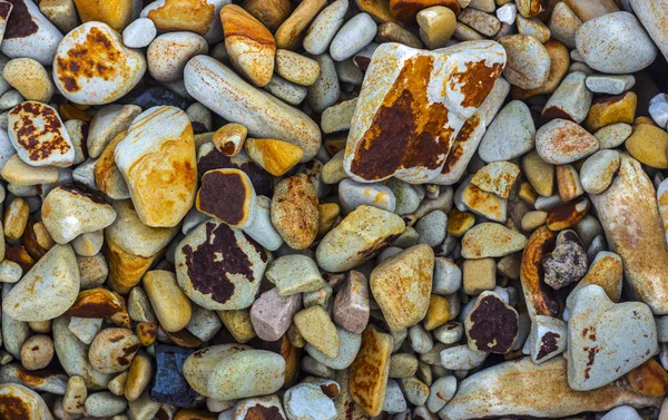 Polerade färgade marmor småsten och halvädelstenar bakgrund — Stockfoto