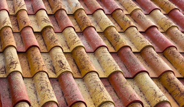 Red plastic roof tiles home — Stock Photo, Image