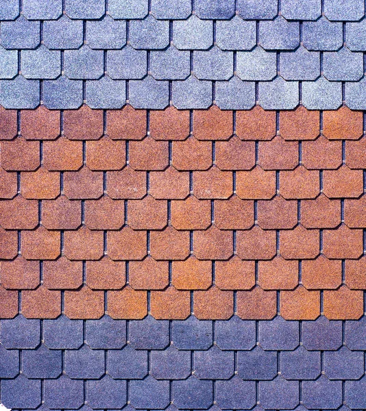 Red plastic roof tiles home