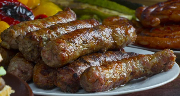 Grilling sausages on barbecue grill. — Stock Photo, Image