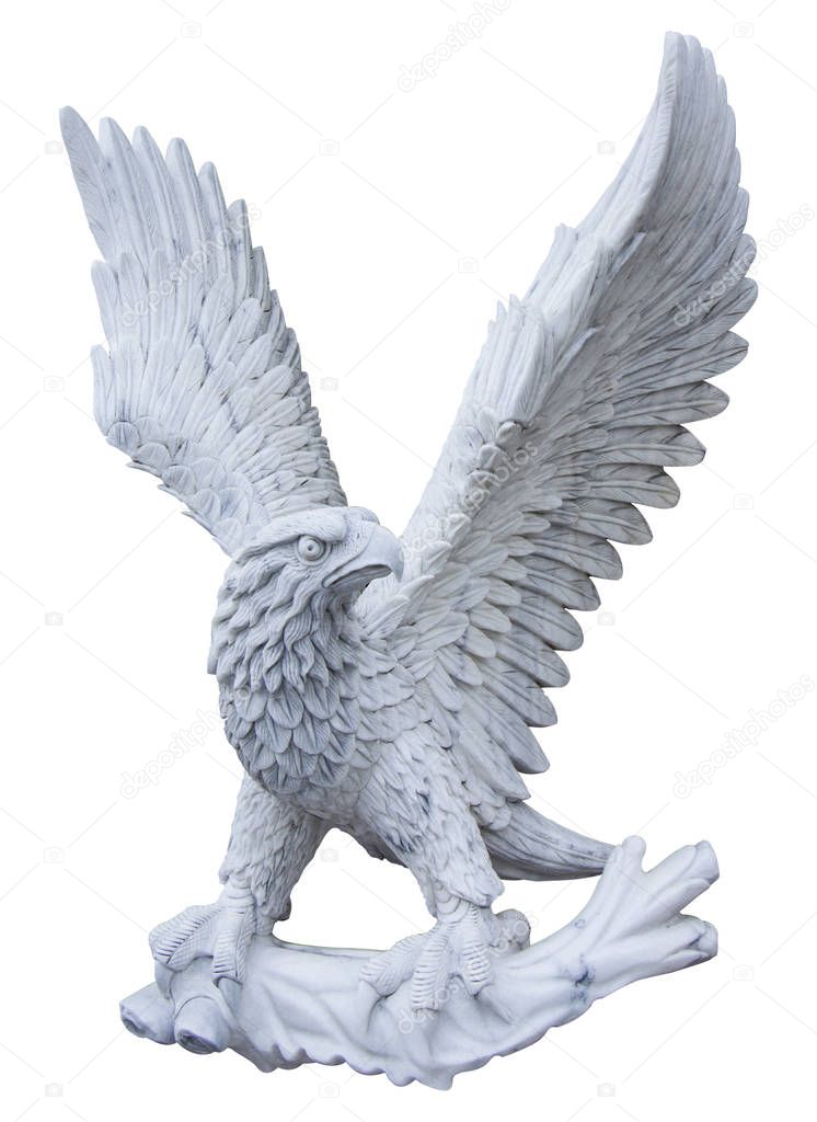 Eagle carved from white marble. Isolated on white