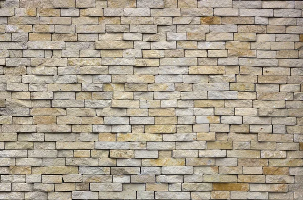 Piedra multicolor moderna, pizarra travertino arenisca pared utilizada para fondo — Foto de Stock