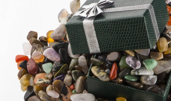 Gift box with semiprecious stones close-up — Stock Photo, Image