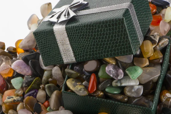 Gift box with semiprecious stones close-up