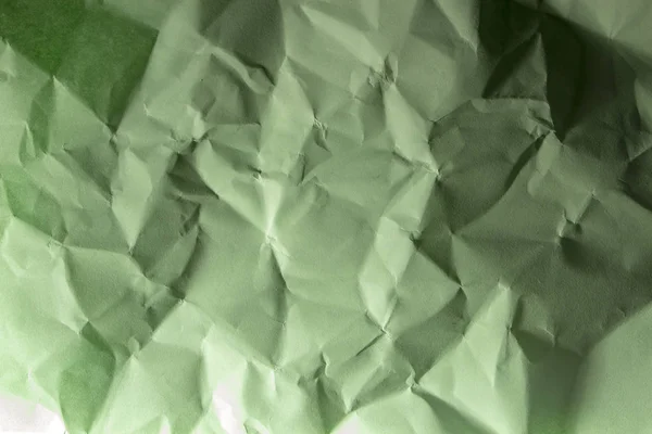 Crepe verde Papel arrugado Textura fondo abstracto — Foto de Stock