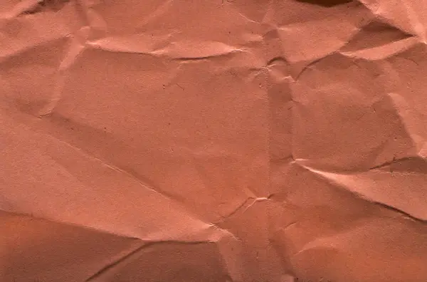 Червоний пожмаканий зморшкуватою папери текстури для фону — стокове фото