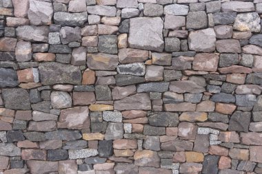 Dikdörtgen taş kullanarak sorunsuz taş duvar, kırmızı ve gri tonları