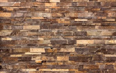 sarı-kahverengi tuğla duvarın arkaplan dokusu