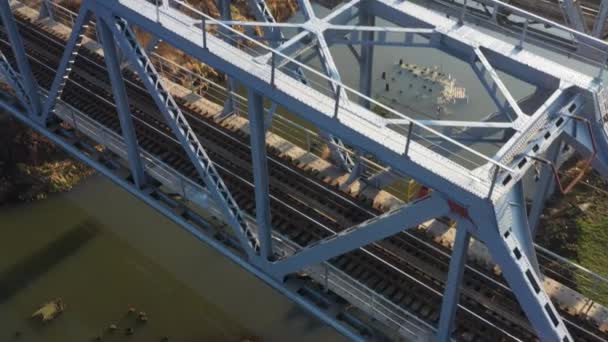 Aerial view of a drone on a railway metal bridge — Stock Video