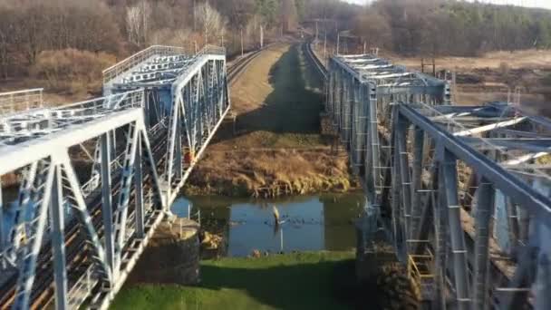 Aerial view of a drone on a railway metal bridge — Stock Video