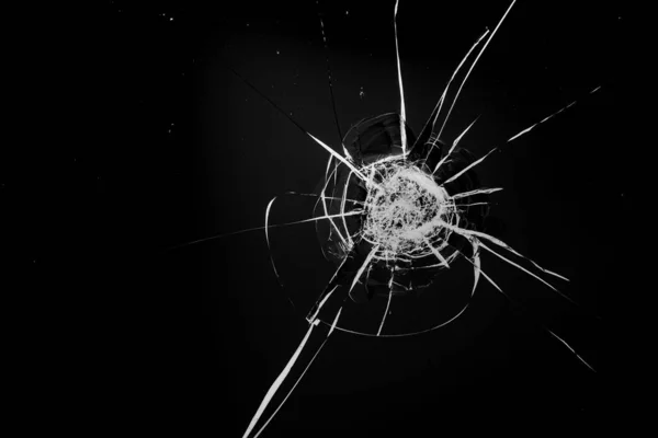 Round white cracks in glass on black background. — 스톡 사진