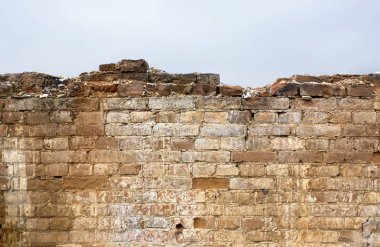 Eski malikanenin harabelerinde bir duvar parçası. Tasarım elementi. Antika arkaplan.