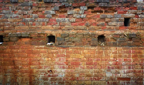 Textura de pared de ladrillo rojo viejo o fondo — Foto de Stock
