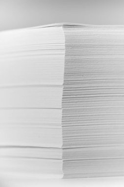Stack of office paper, on a white background. Concept, minimalism