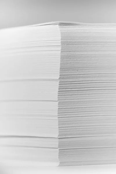 Stack of office paper, on a white background. Concept, minimalism — 스톡 사진