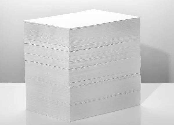 Stack of office paper, on a white background. Concept, minimalism — 스톡 사진