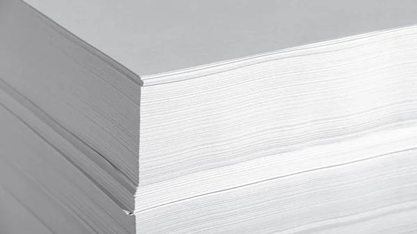 Stack of office paper, on a white background. Concept, minimalism — 스톡 사진