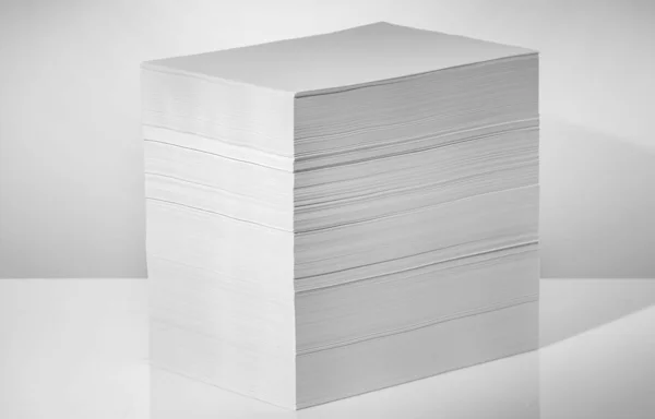Stack of office paper, on a white background. Concept, minimalism — 스톡 사진