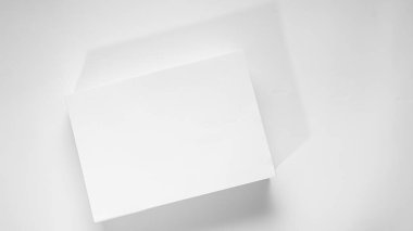 Stack of white office paper on light background, top view, place for text.