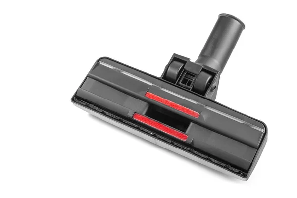 Black brush head for vacuum cleaner on white background.