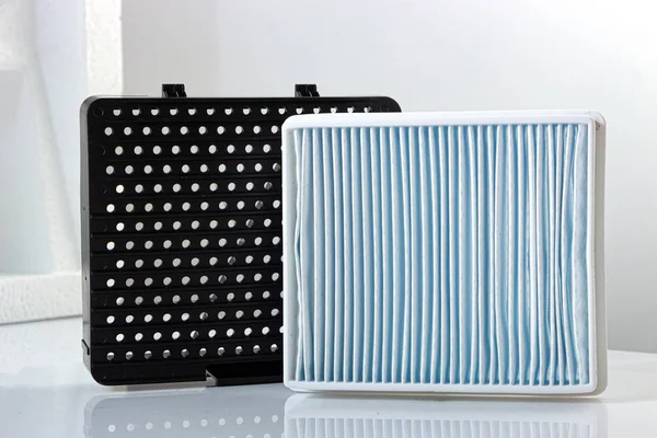 New white square dust filter for vacuum cleaner. — Stockfoto