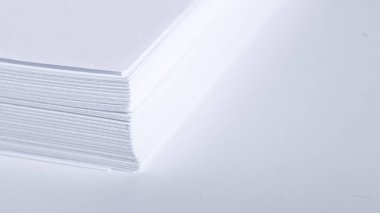 Minimalism. Top view of a stack of office paper for the printer with blank space for information.