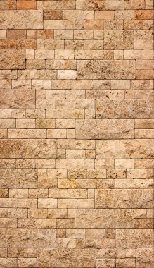 Taş duvar dokusu, kare sarı karo. Tasarım ögesi veya arkaplan.