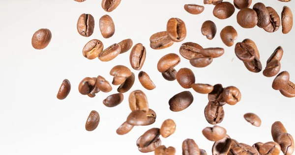 Falling Coffee Beans Light Background — 스톡 사진